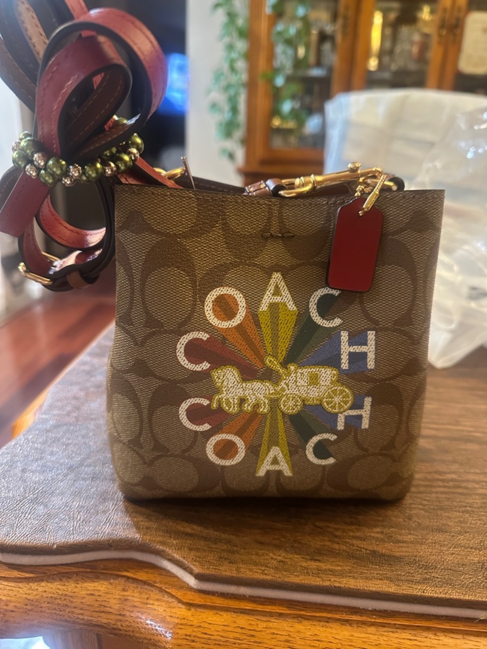 Coach Brown Signature Canvas Mini Crossbody with Rainbow Logo and Red Tag